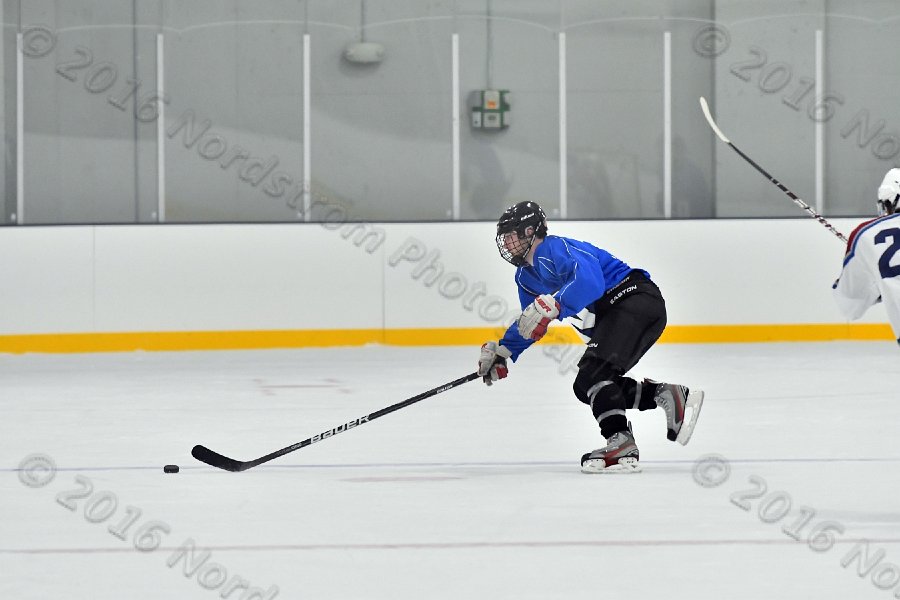 Wheaton College Men\'s Ice Hockey vs Middlesex Community College. - Photo By: KEITH NORDSTROM